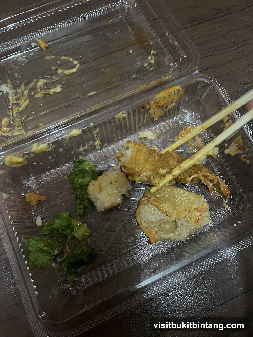Leftover Food in Takeout Container