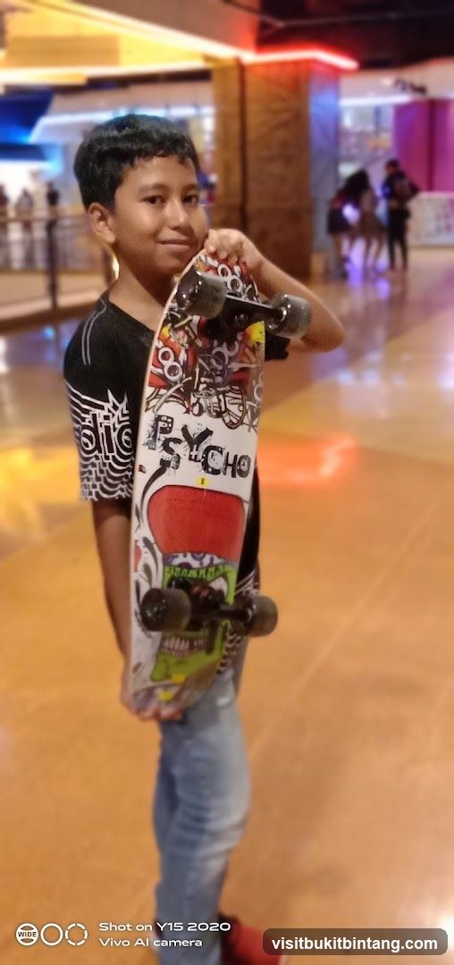 Boy with Skateboard