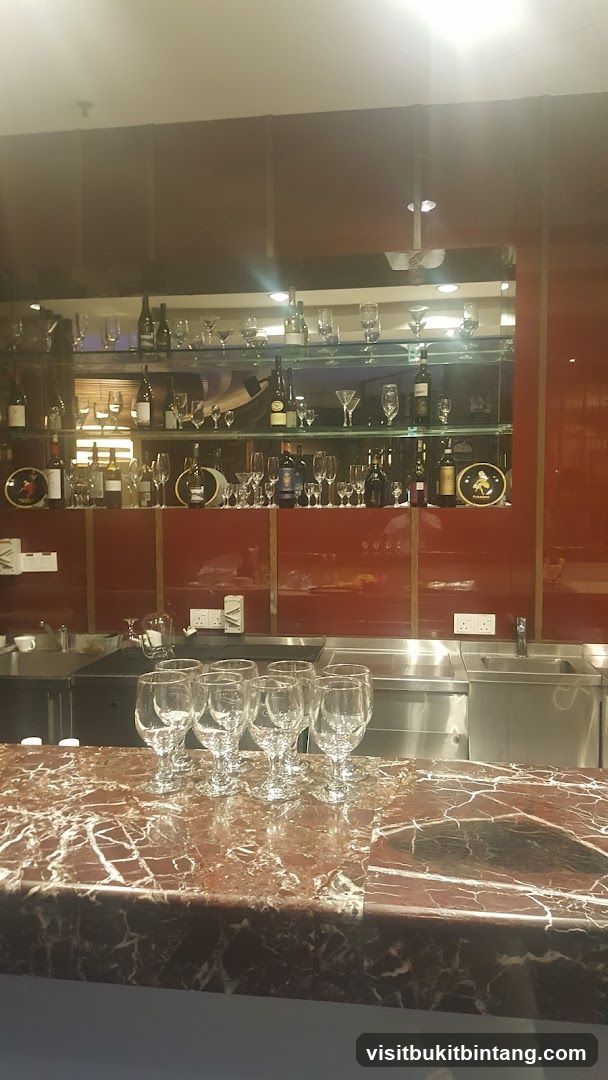 Bar Counter with Wine Glasses and Bottles