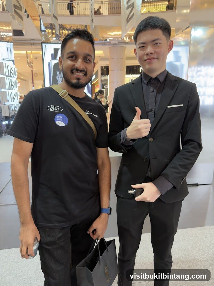Two men posing for a photo in a mall
