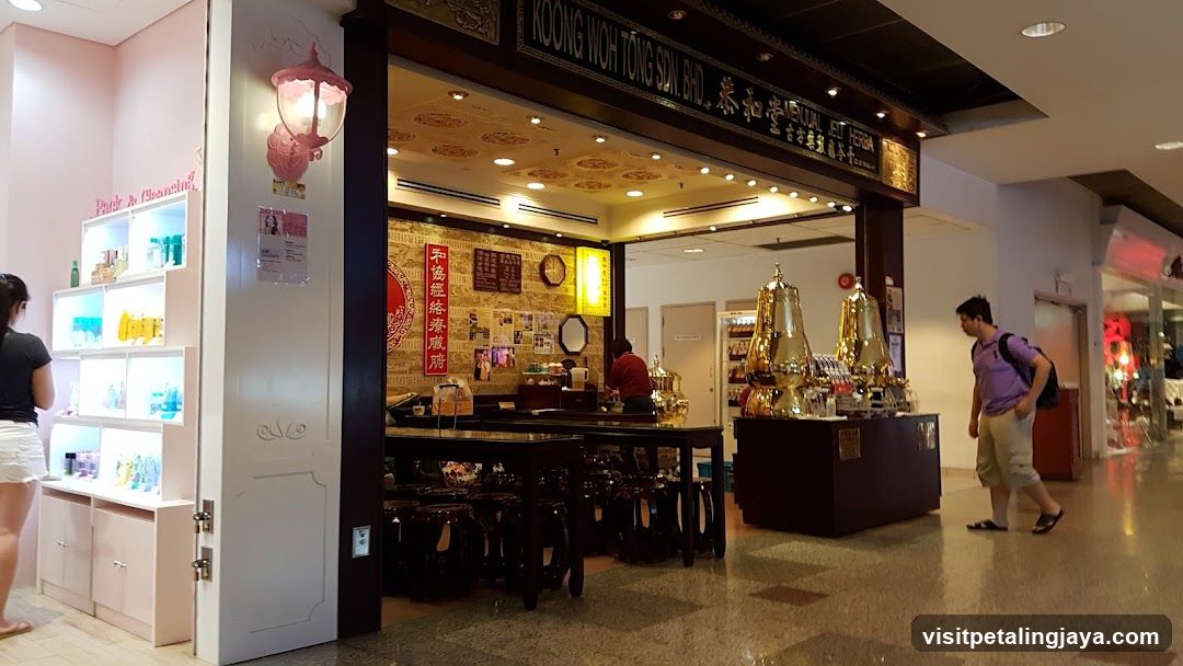 Interior of a shop with display shelves and customers