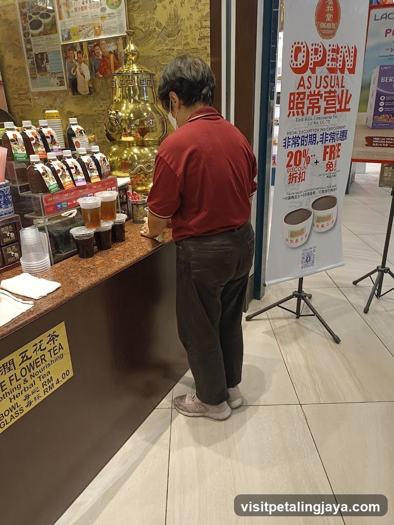 Customer at Tea Shop Counter