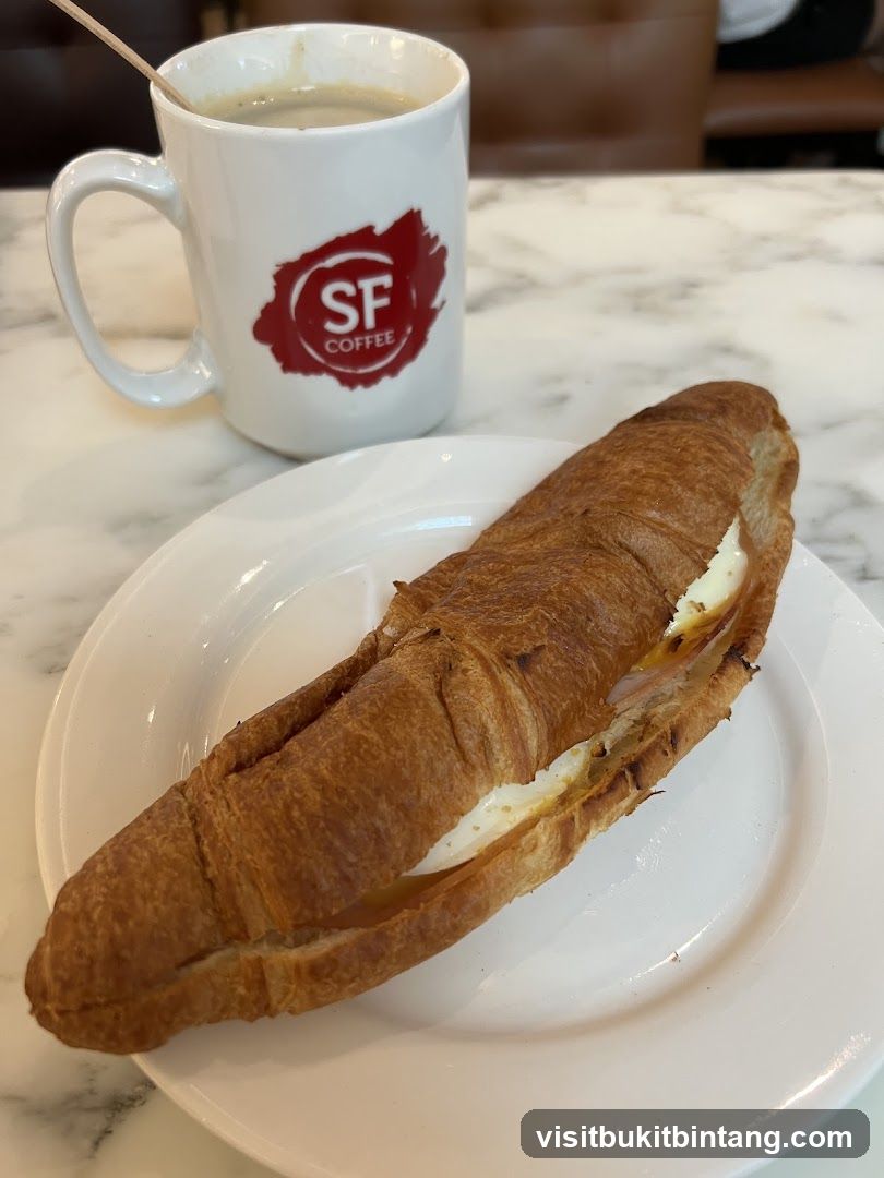 Coffee and Croissant Sandwich