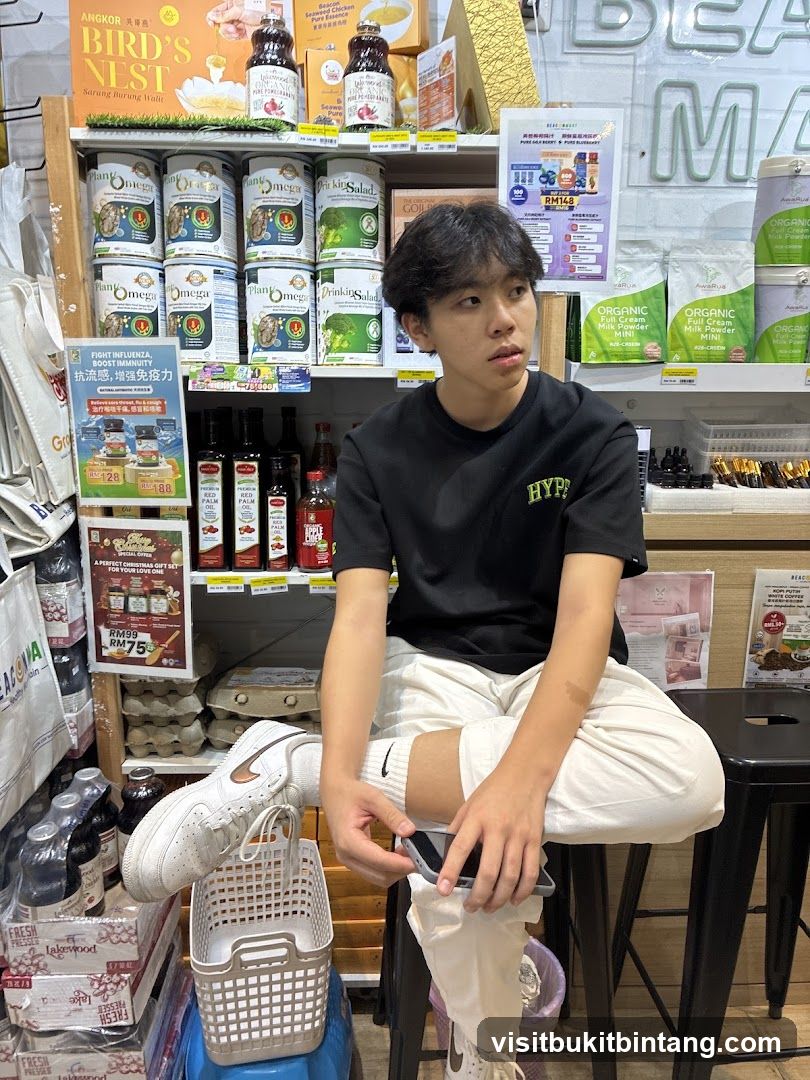 Young man sitting in a store