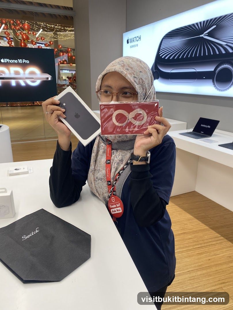 Woman holding iPhone box and red packet