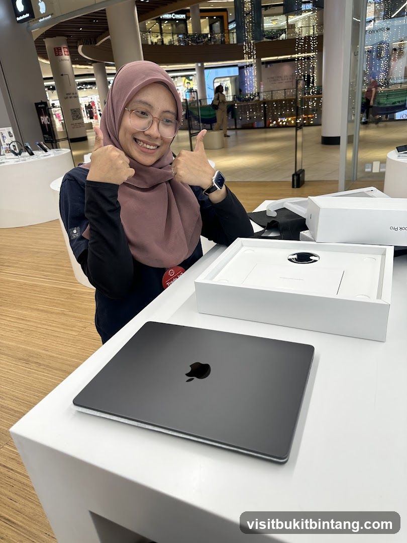 Happy customer with new MacBook Pro