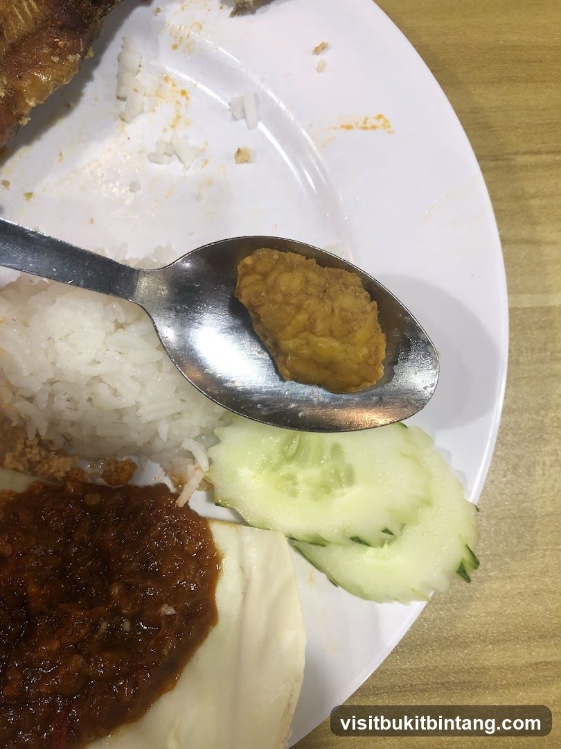 Fried Food with Rice and Condiments