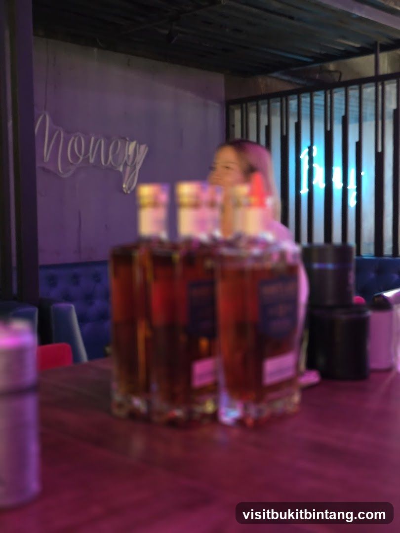 Bar Interior with Bottles and Neon Signs