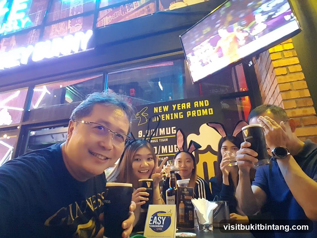 People enjoying drinks at a bar