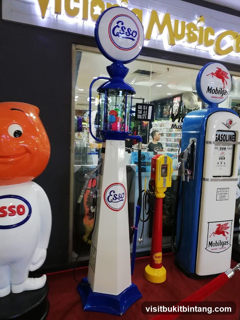 Vintage Gas Pumps and Esso Mascot