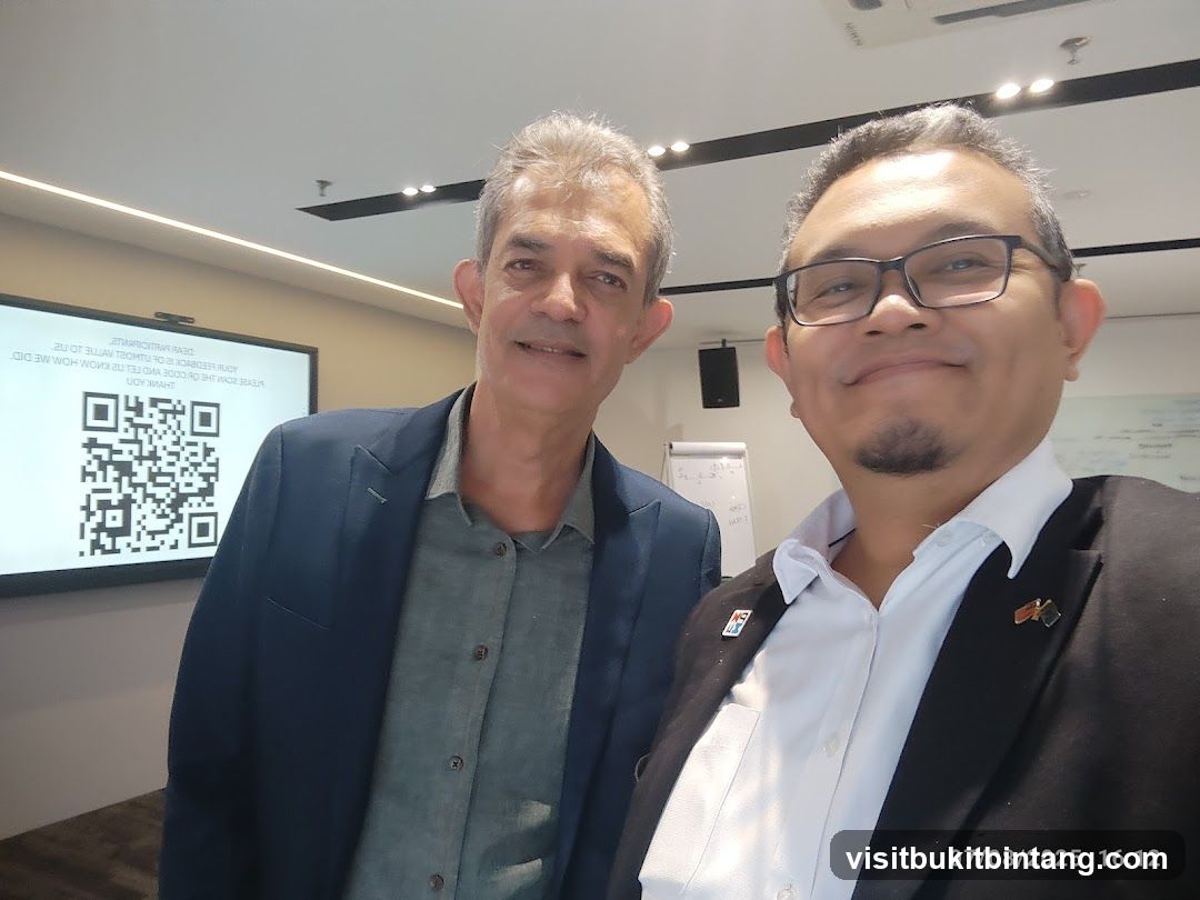 Two men posing for a selfie