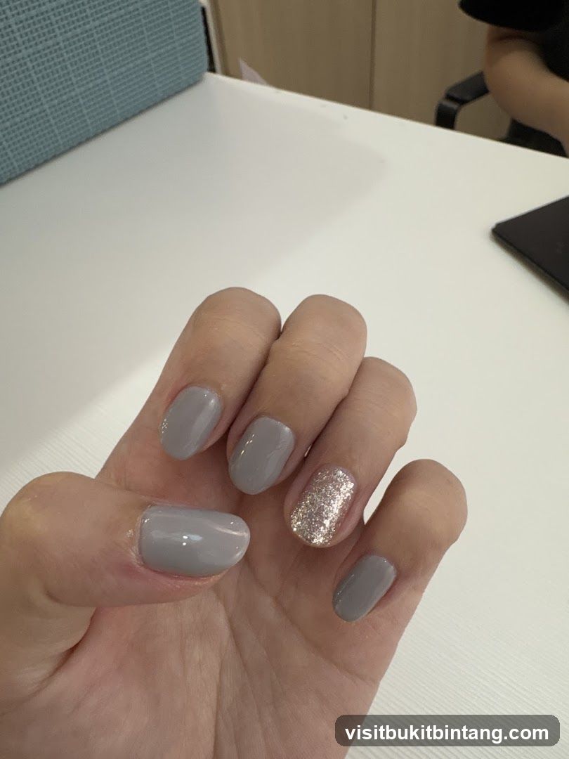 Gray Nails with Glitter Accent