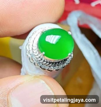 Jewelry Ring with Green Gemstone