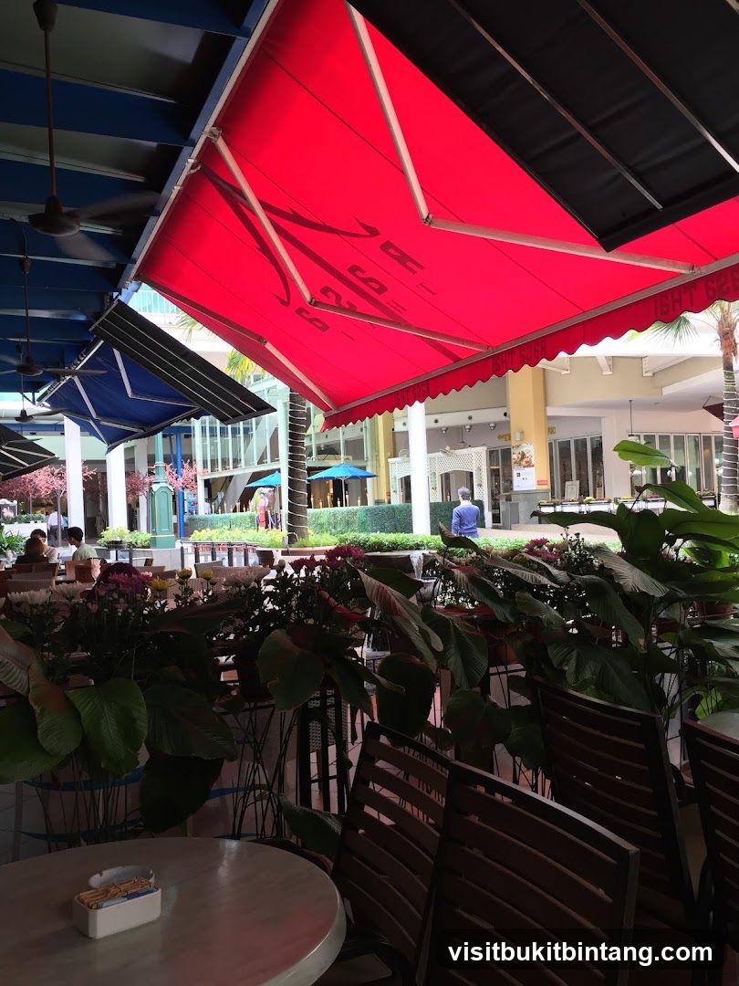 Outdoor Seating Area with Red Awning