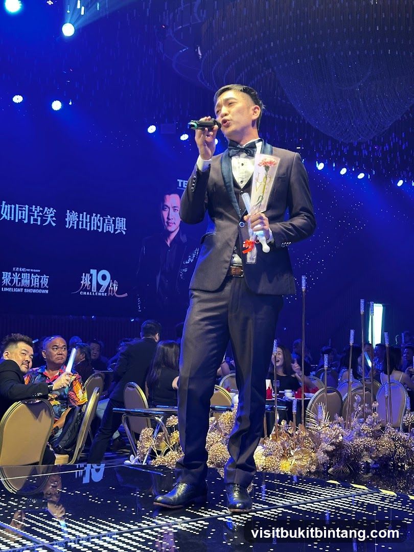 Man speaking into a microphone at an event