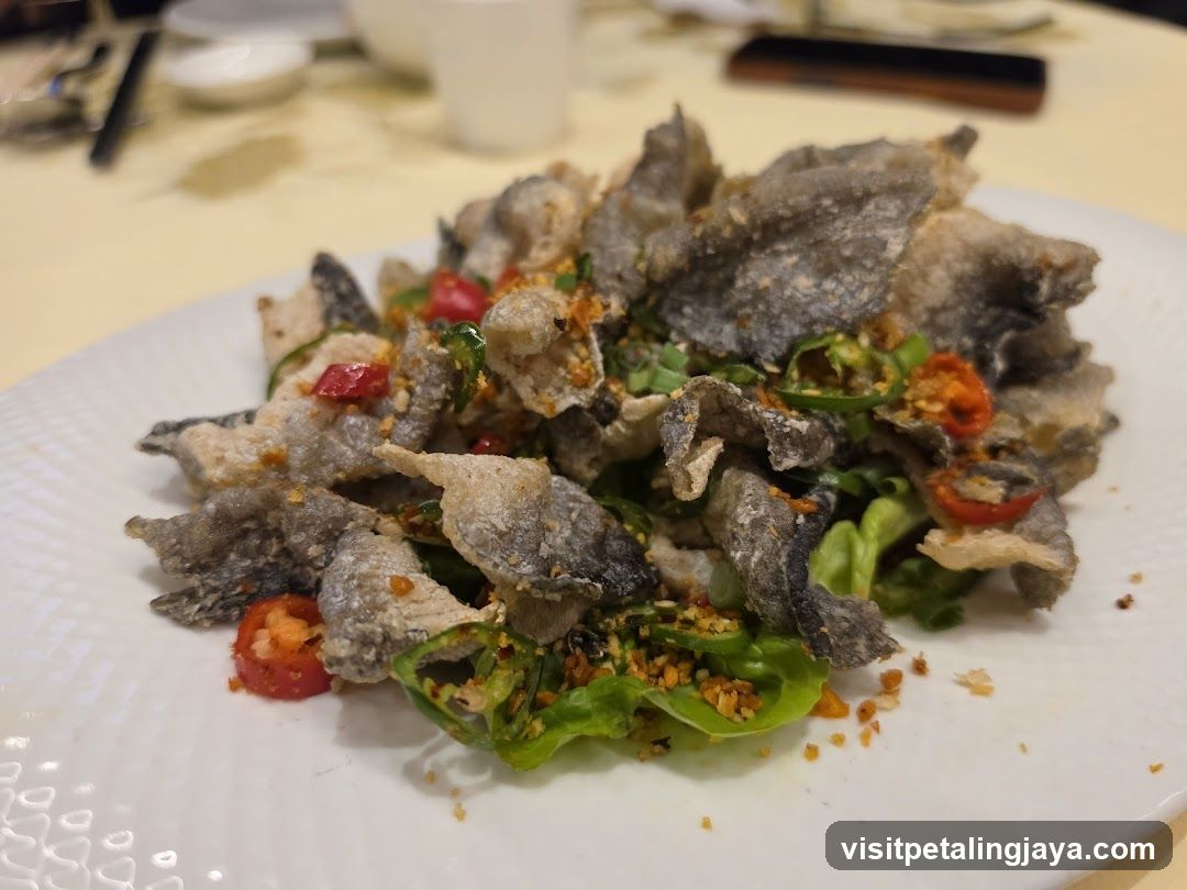 Crispy Fish Skin Salad with Chili and Greens