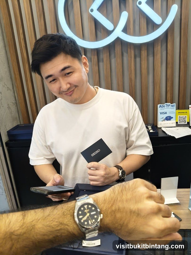 Salesperson showing a watch