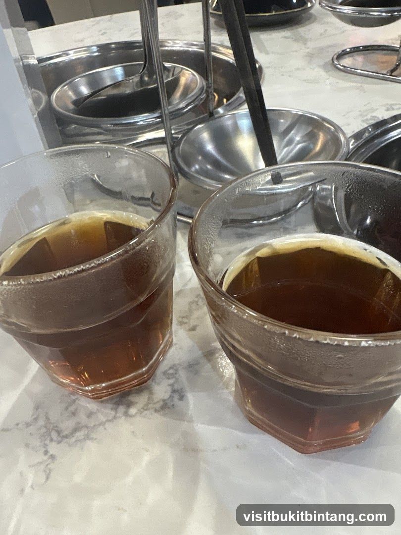 Two glasses of iced tea on a table