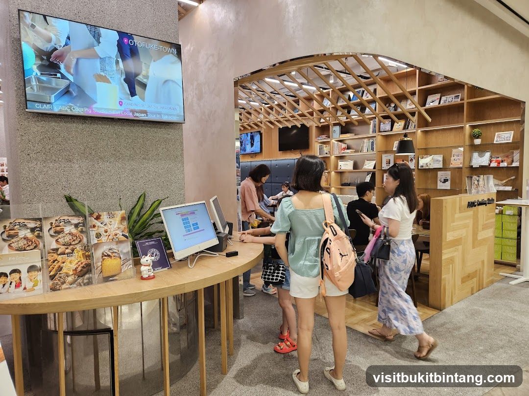 Interior of a store with a TV screen and display