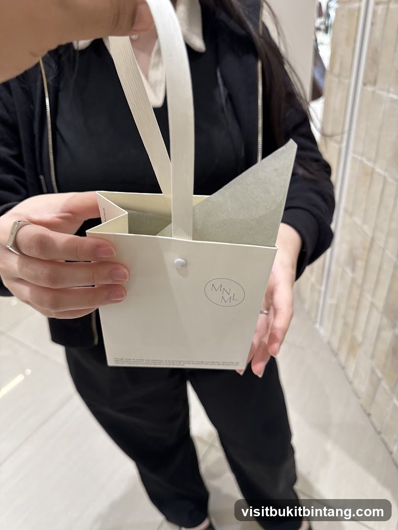 Person holding a shopping bag