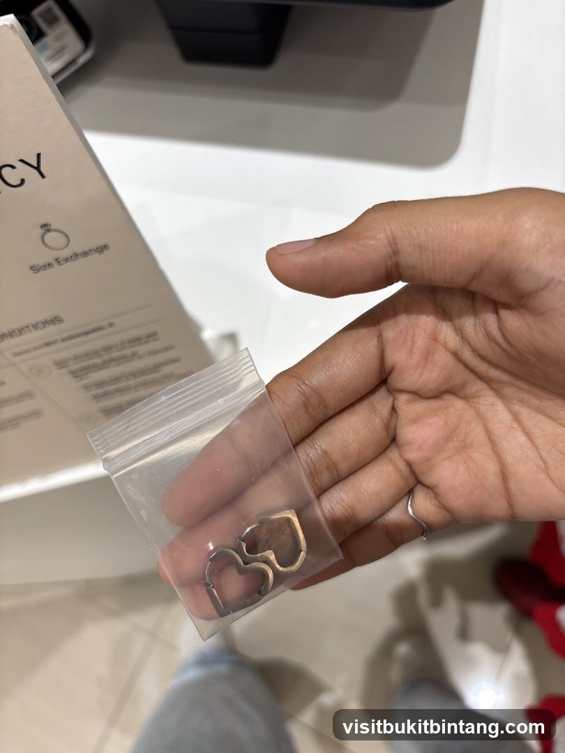Heart-shaped earrings in a plastic bag