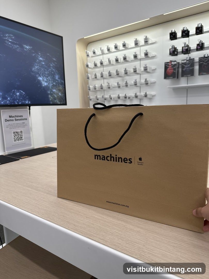 Brown paper shopping bag with "machines" logo