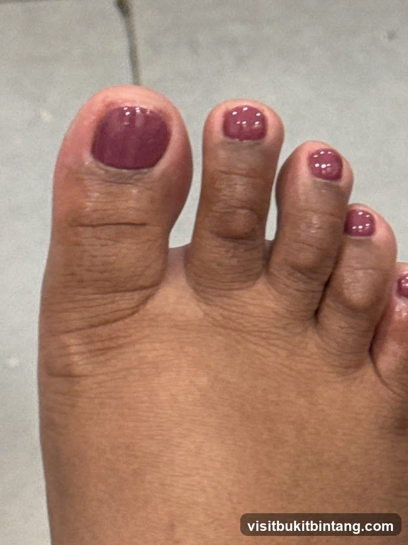 Toes with Burgundy Nail Polish