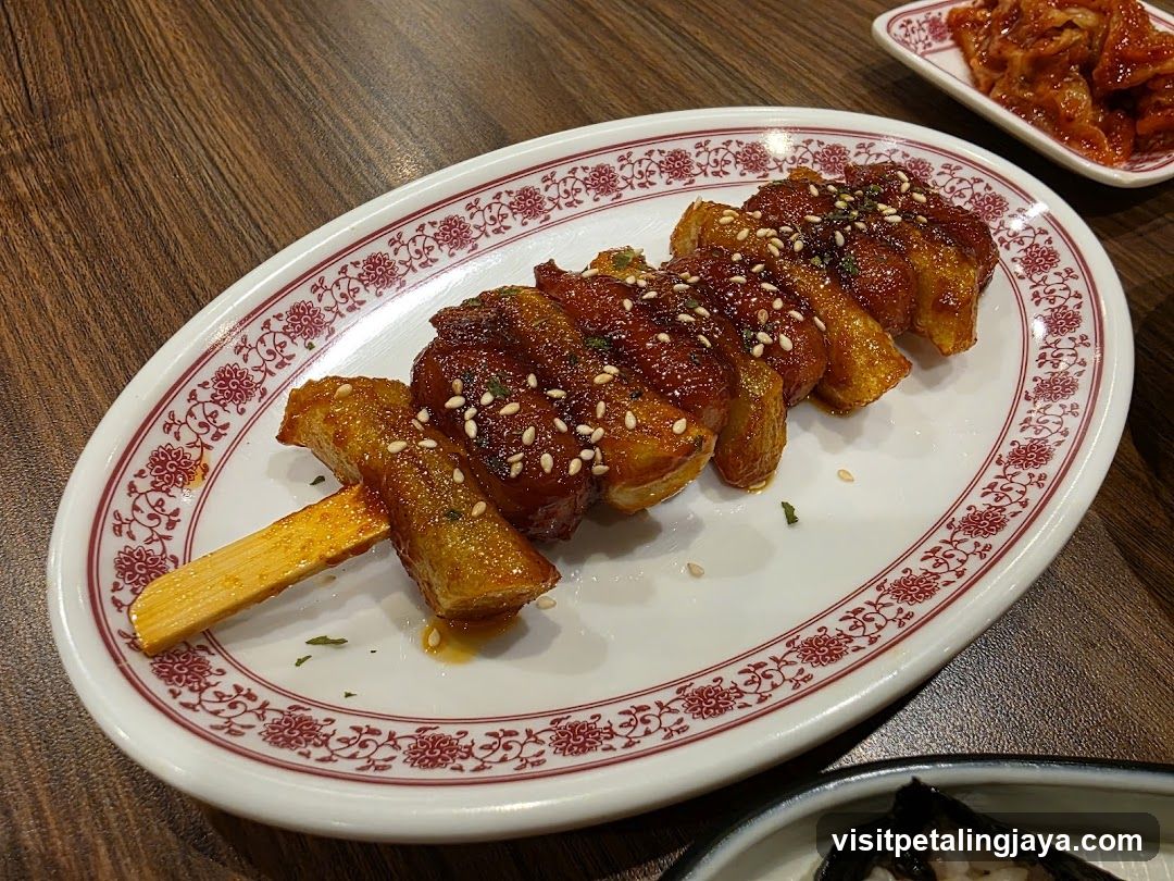 Glazed Pork Belly Skewers with Sesame Seeds