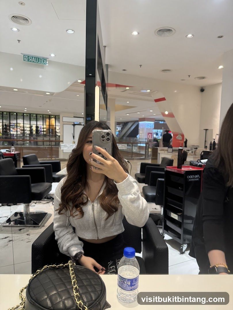 Woman taking a selfie in a salon