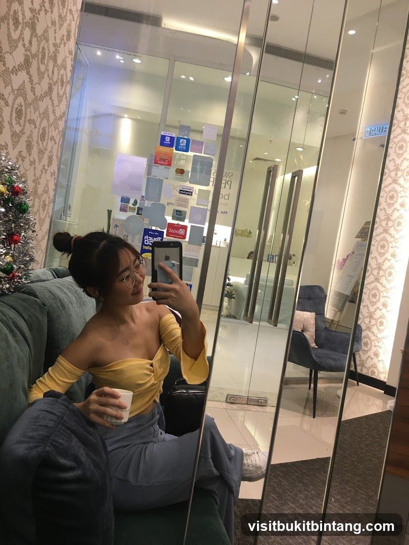 Woman taking a selfie in a salon