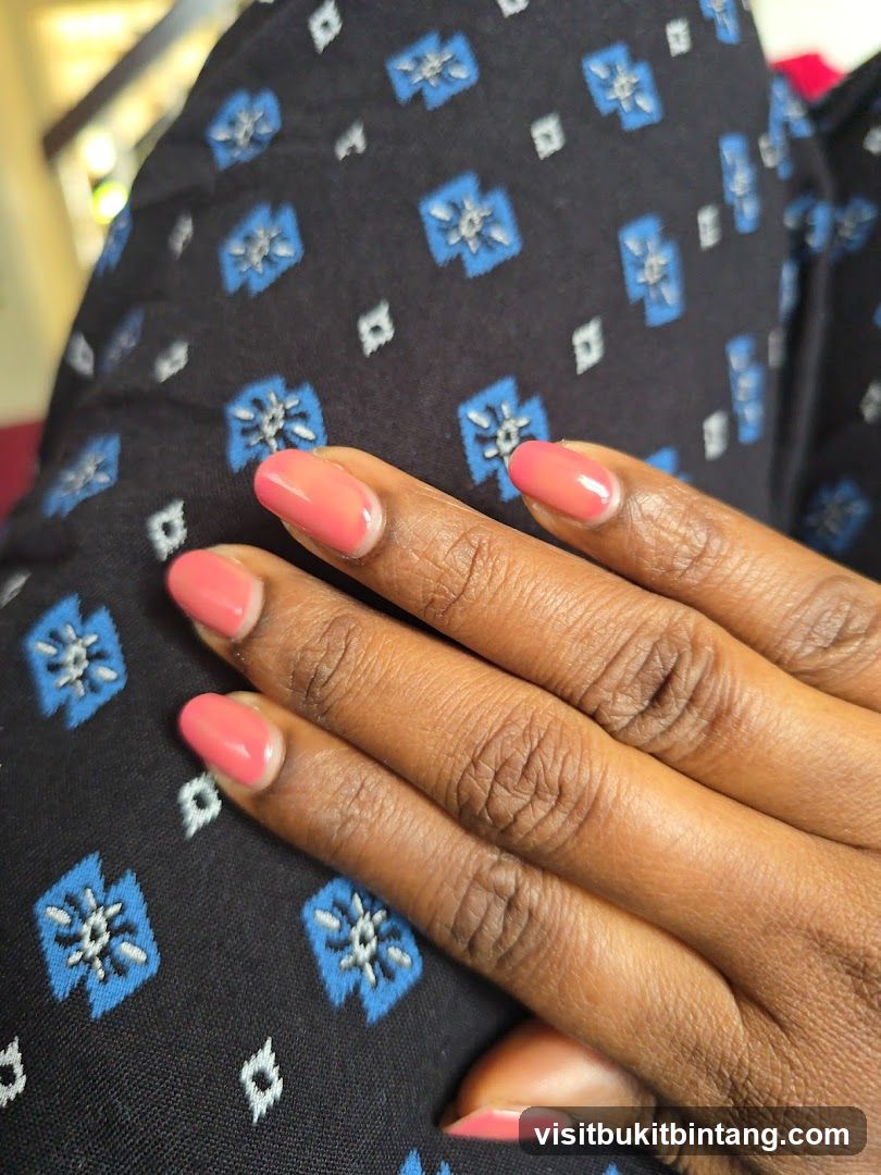 Nails with Coral Polish