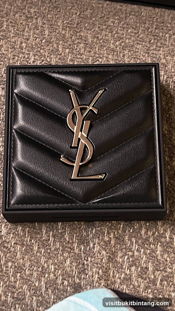 Black quilted wallet with YSL logo