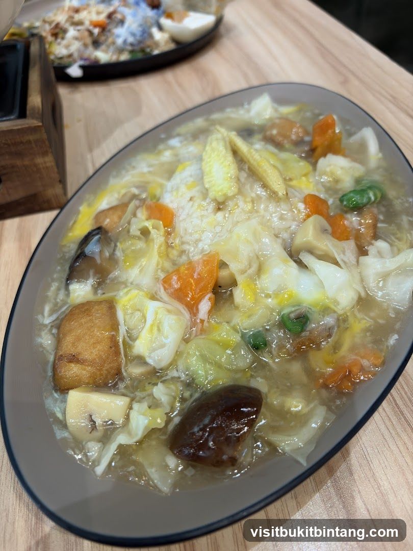 Rice with mixed vegetables and gravy