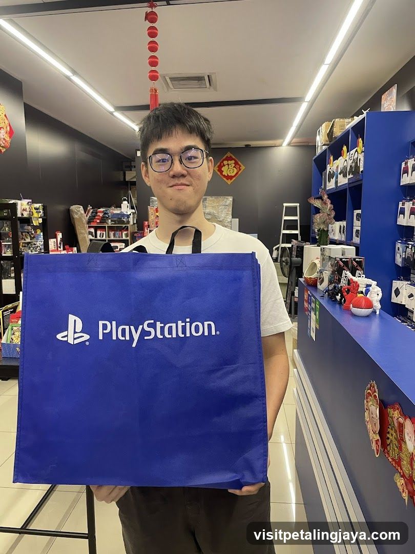 Person holding PlayStation bag in store