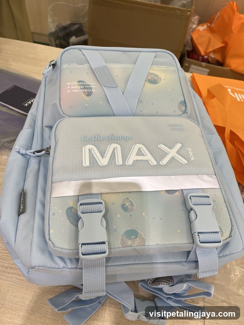 Blue Backpack with 'MAX' Design