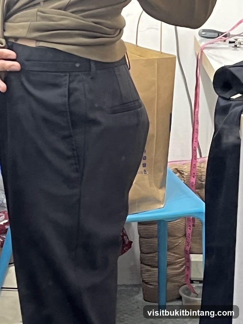Person wearing black pants