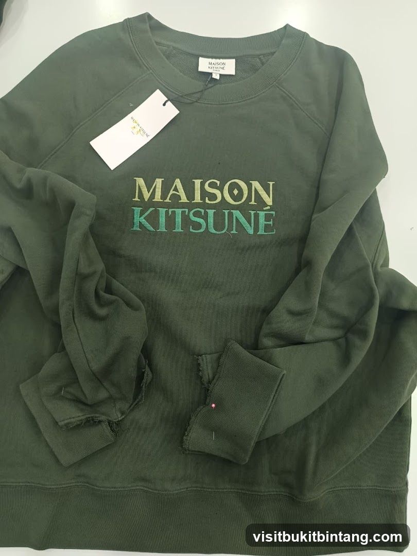 Green sweatshirt with embroidered logo