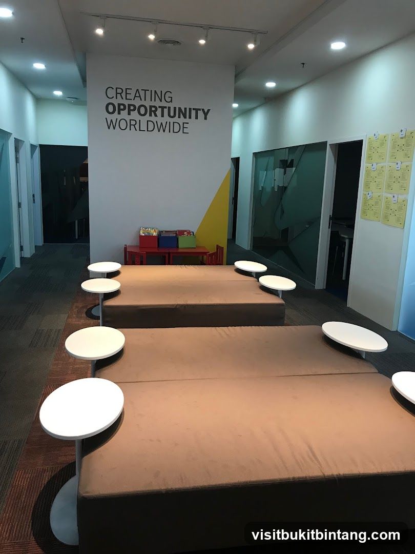 Office common area with seating and motivational text