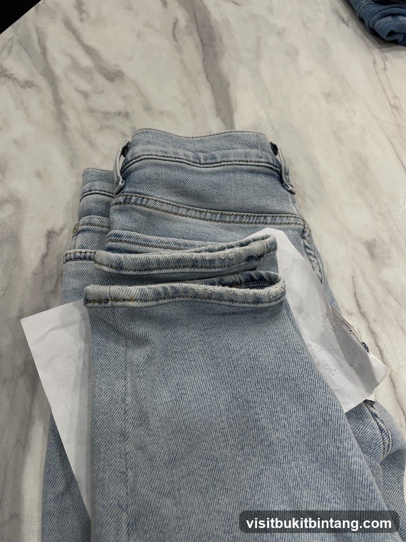 Folded Jeans with Tag