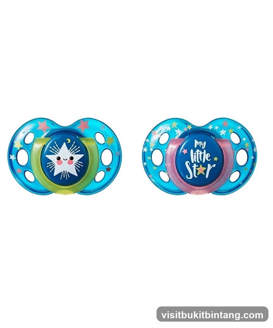 Two pacifiers with star designs