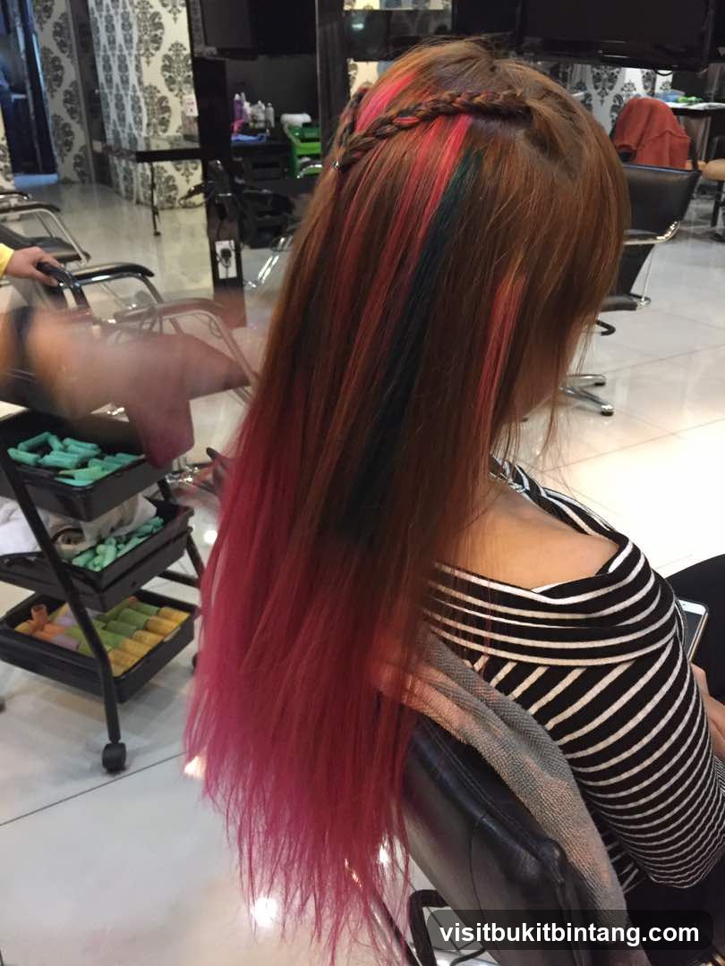 Woman with colorful hair in salon