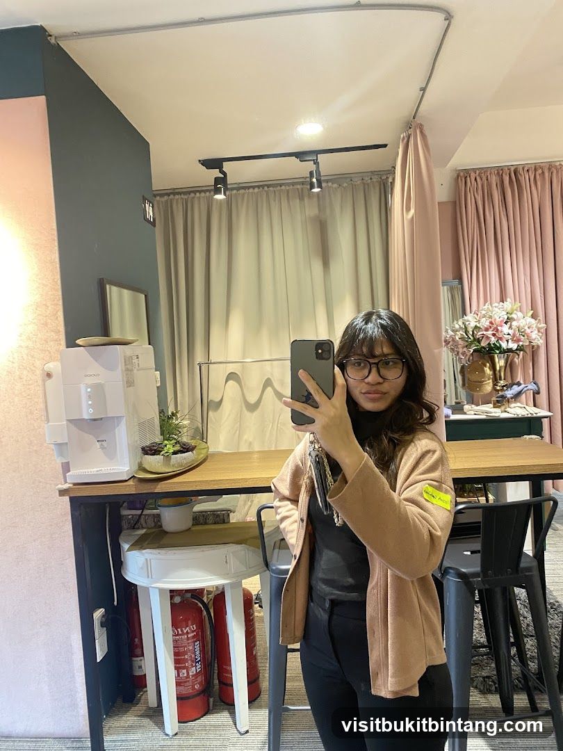 Woman taking a mirror selfie in a store