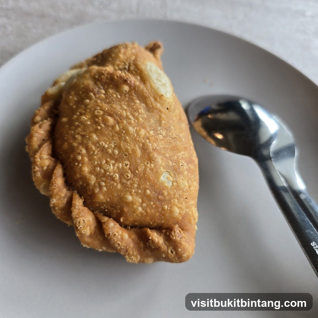 Fried Pastry with Spoon