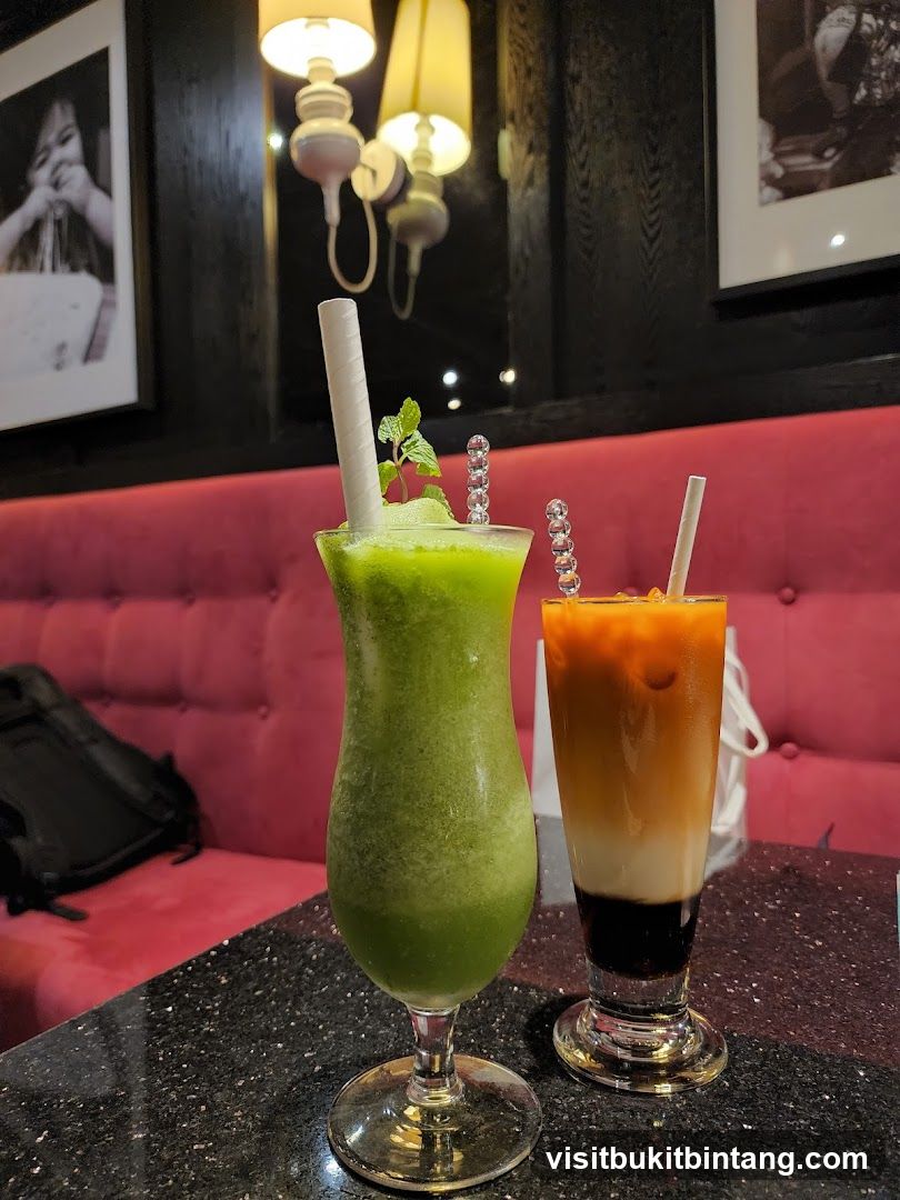 Two colorful drinks on a table