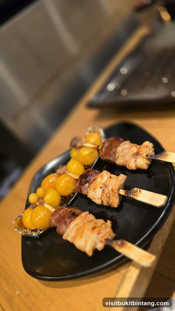 Skewers of grilled meat and quail eggs