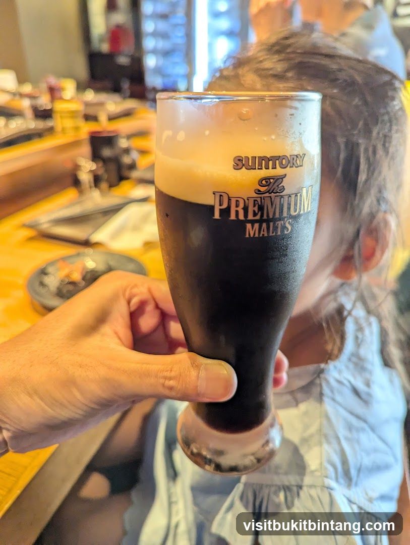 Glass of Suntory The Premium Malt's Beer