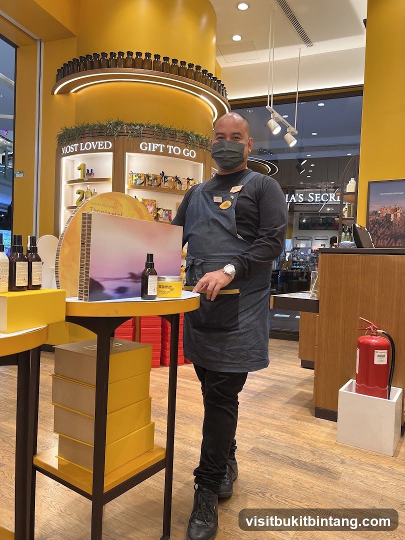 Store employee in a yellow-themed store
