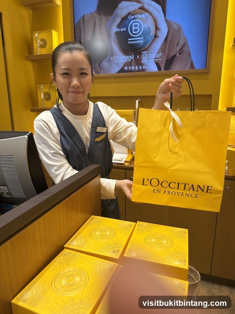 L'Occitane Employee with Shopping Bag