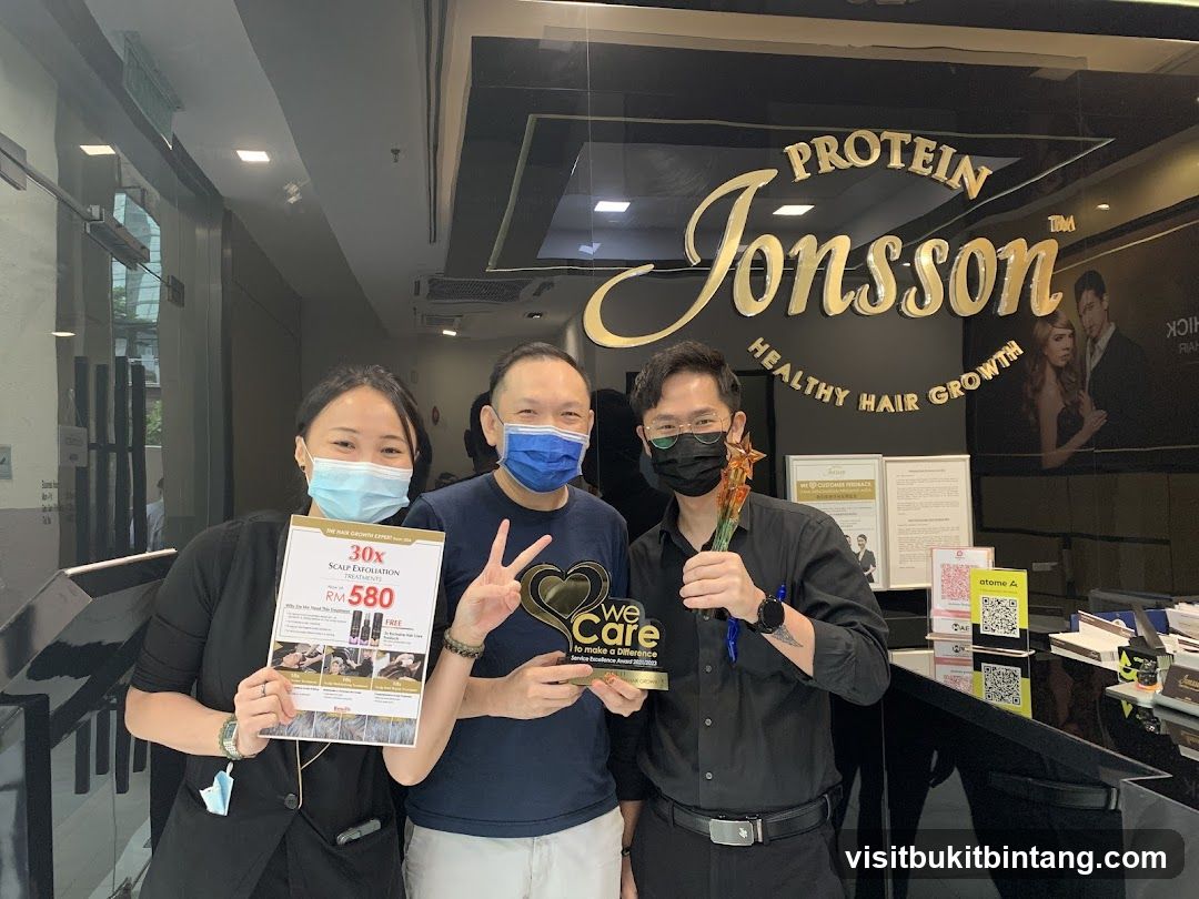 Staff with promotional material and award
