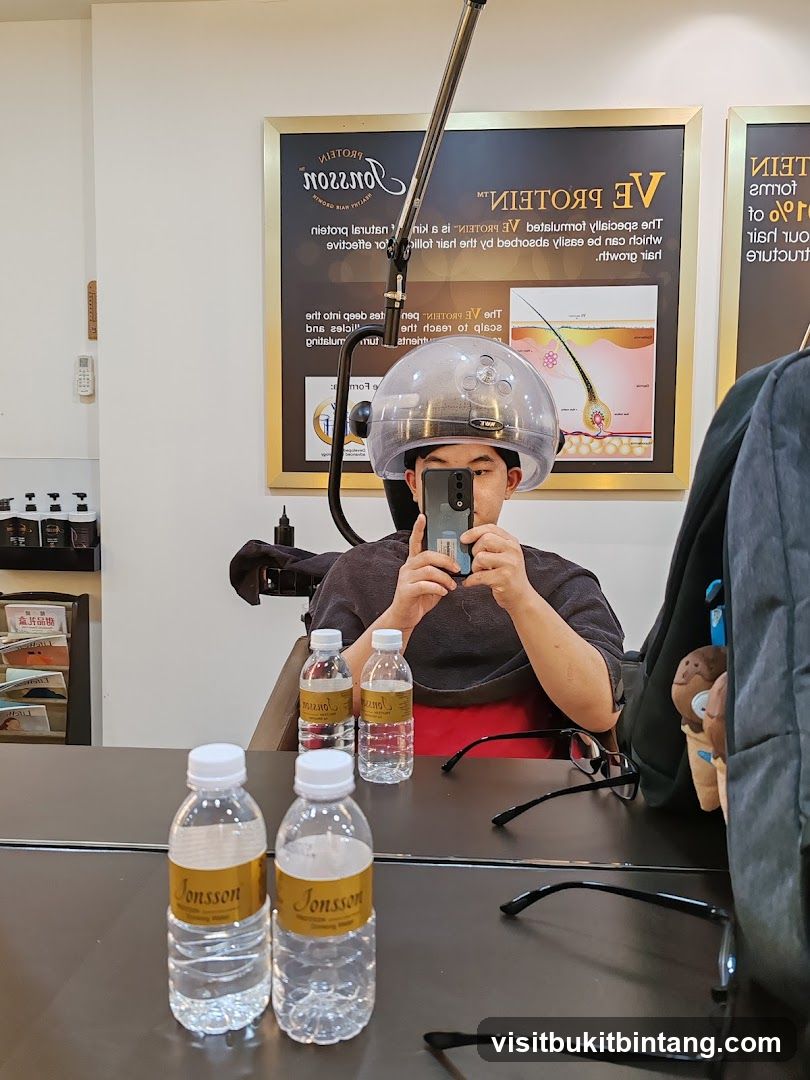Man under hair dryer
